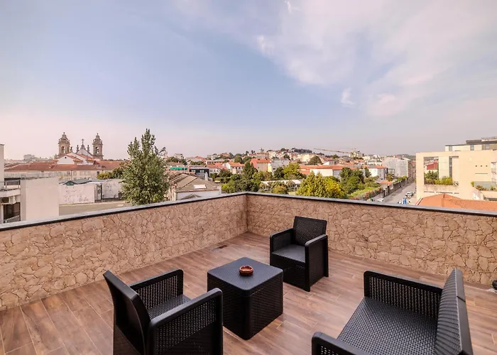 Terrace Flat By House And People * براغا