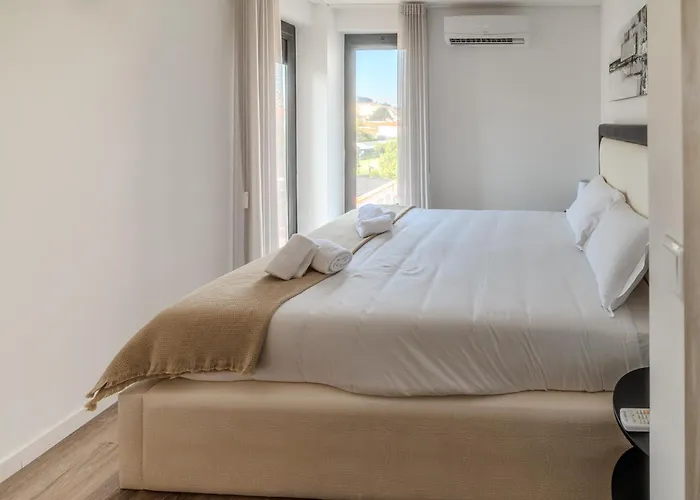 Terrace Flat By House And People * براغا